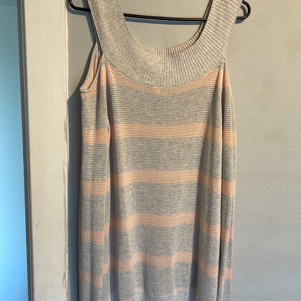 Brand new light weight peek a boo shoulder sweater